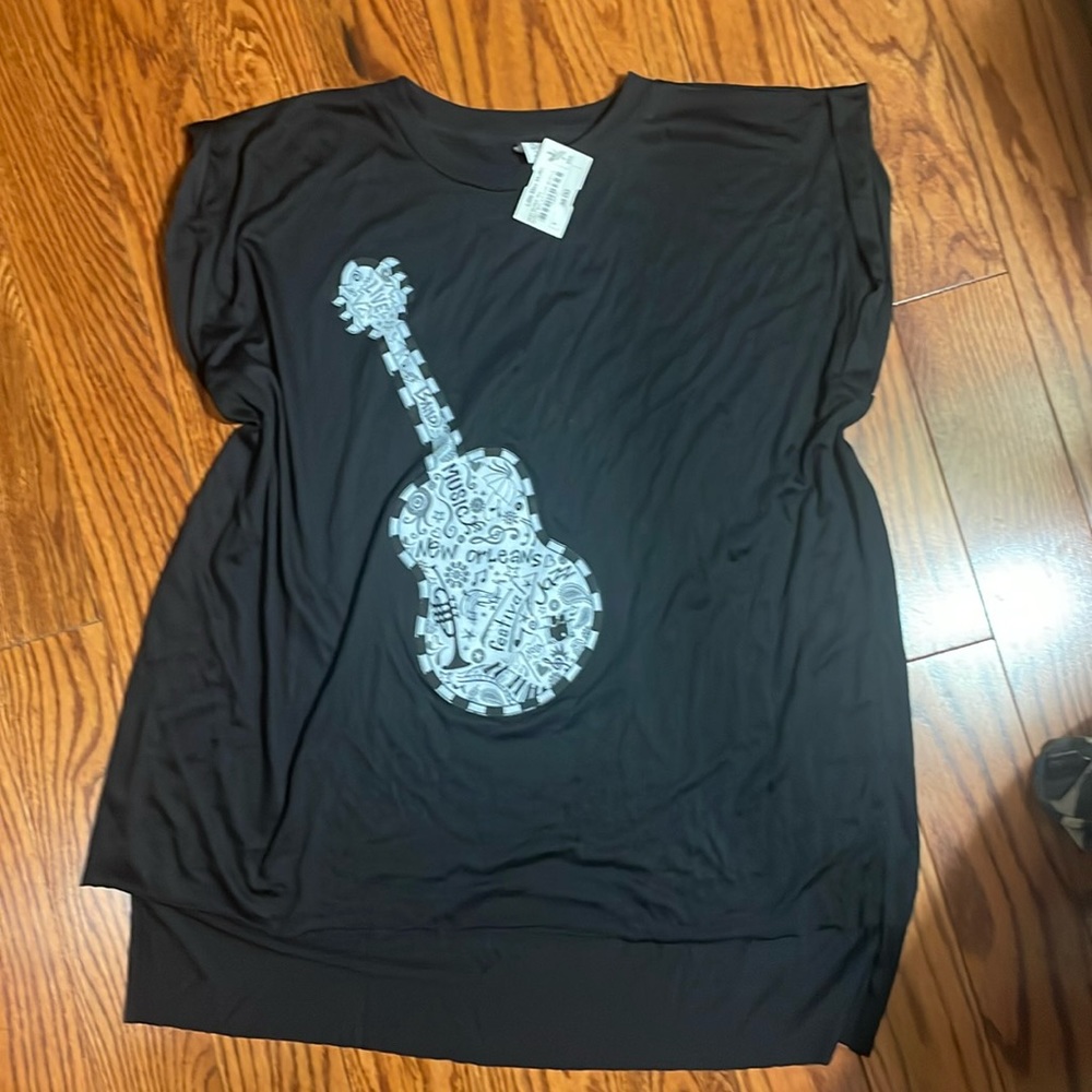 New Orleans guitar black shirt.